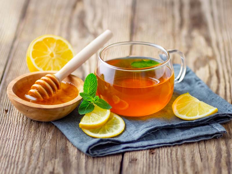 Nước ép chanh mật ong giúp chữa sỏi mật tại nhà an toàn